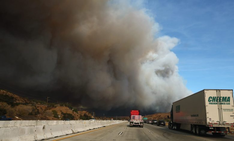 New wildfire near Los Angeles explodes to 9,400 acres, forces evacuations