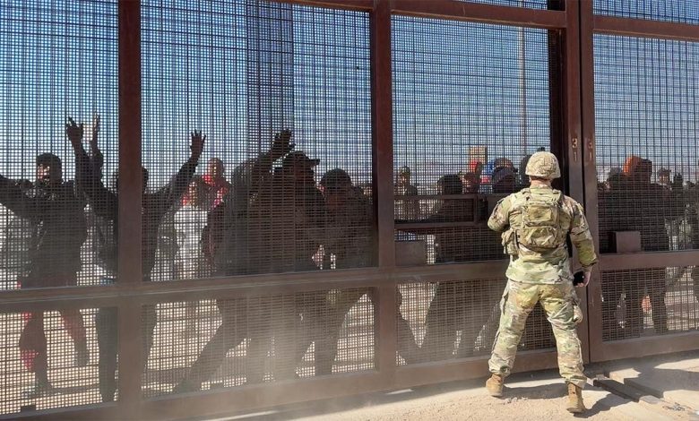 Migrants storm the gate at the border in El Paso