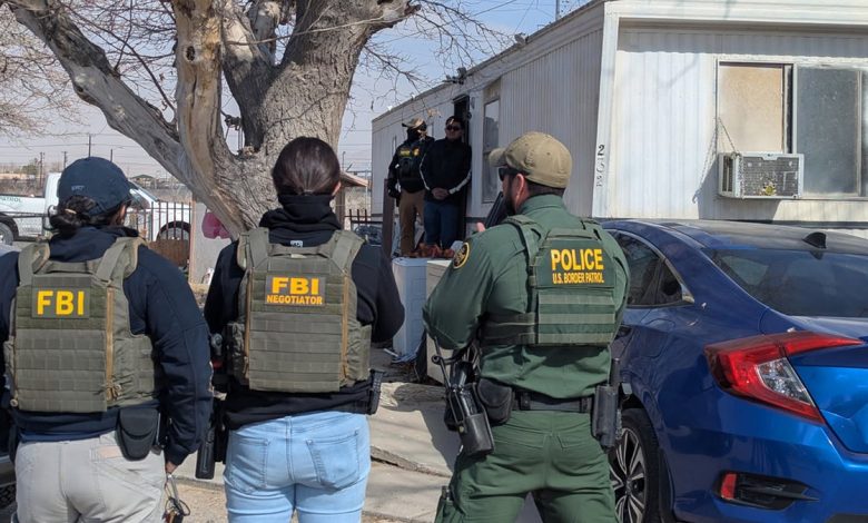 Officers from Homeland Security and the FBI conduct immigration enforcement in El Paso, Texas