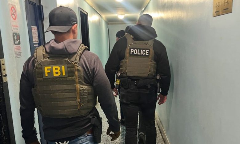 Officers from the FBI conduct immigration enforcement in New York