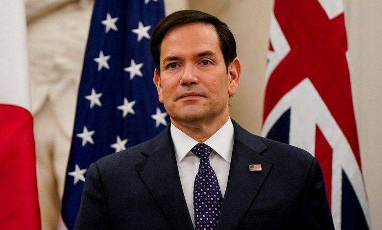 Marco Rubio in front of the US flag