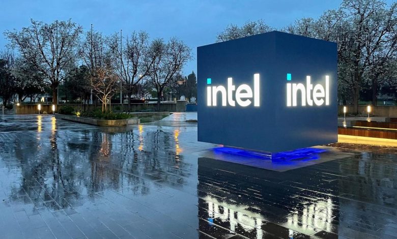 Intel Headquarters Robert Noyce Building in Santa Clara, California at night with Intel sign lit up.