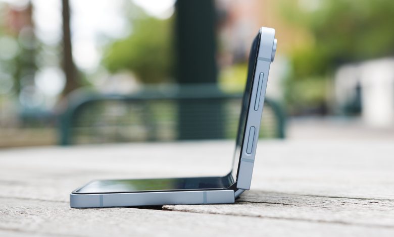 The Samsung Galaxy Z Flip 6, partway open, looking at it from the side.