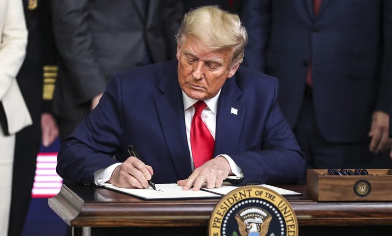 President Donald Trump signs executive order in 2020