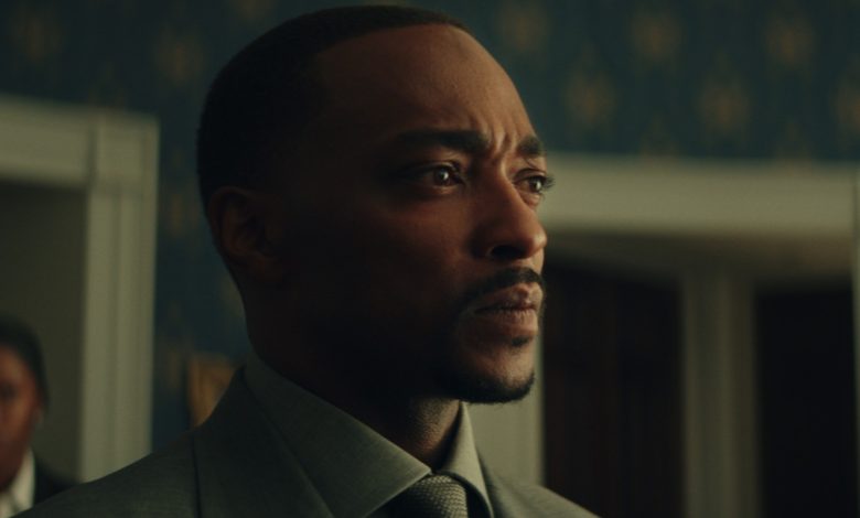 Anthony Mackie looks concerned in a close-up image from the movie Captain America: Brave New World.