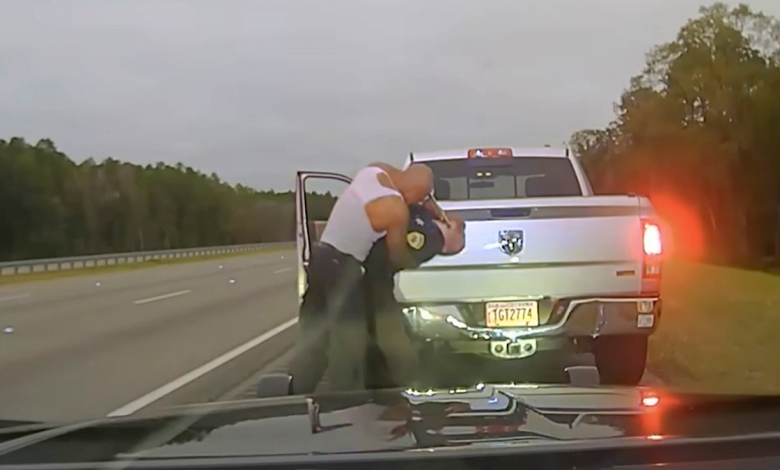 Police dash camera video shows a traffic stop involving a sheriff's deputy and Leonard Cure.