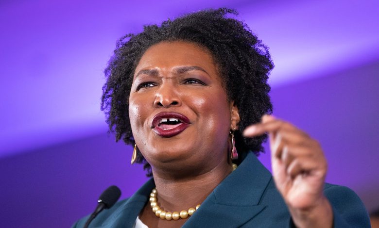 Stacey Abrams at microphone