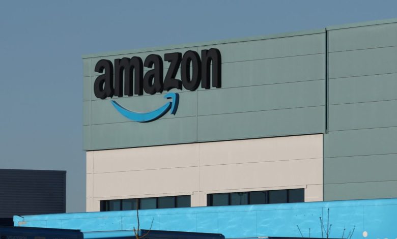 The Amazon logo is displayed outside the Amazon UK Services Ltd Warehouse on December 07, 2022 in Warrington, England