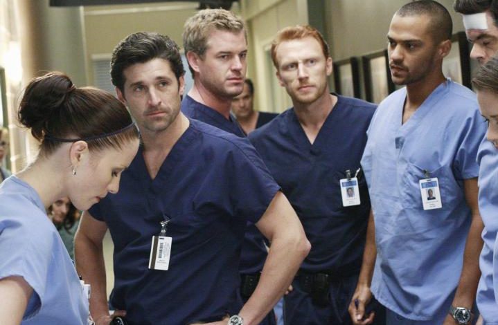 Doctors from Grey's Anatomy in a hallway.