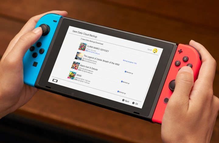 A Nintendo Switch with a list of cloud saves on the display.