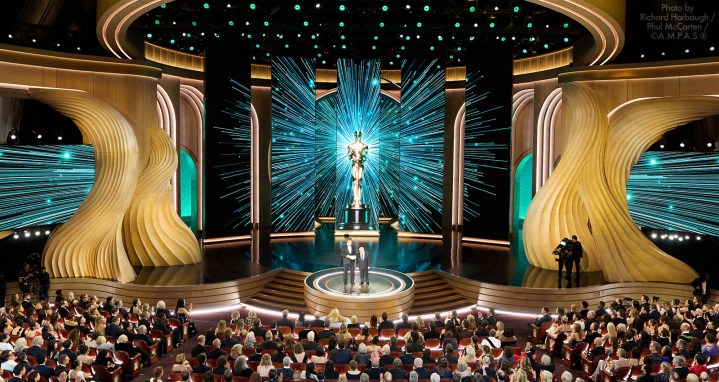 Arnold Schwarzenegger and Danny DeVito present the Oscar® for Film Editing during the live ABC telecast of the 96th Oscars® at the Dolby® Theatre at Ovation Hollywood on Sunday, March 10, 2024.