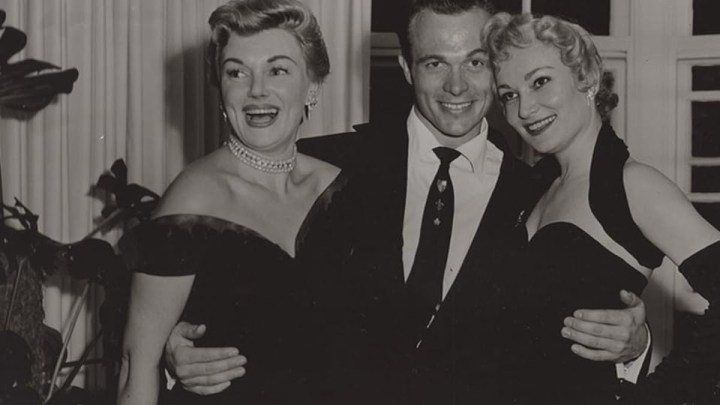 Scotty Bowers and two women in a pic from Scott and the Secret History of Hollywood.