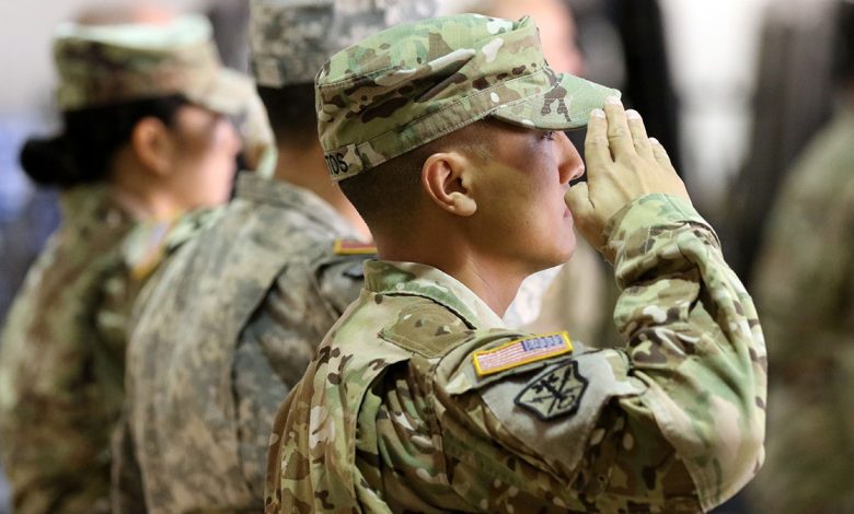 Army national guardsmen salute