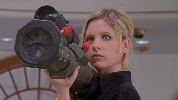 Buffy the Vampire Slayer aims a rocket launcher at the Judge in "Innocence"