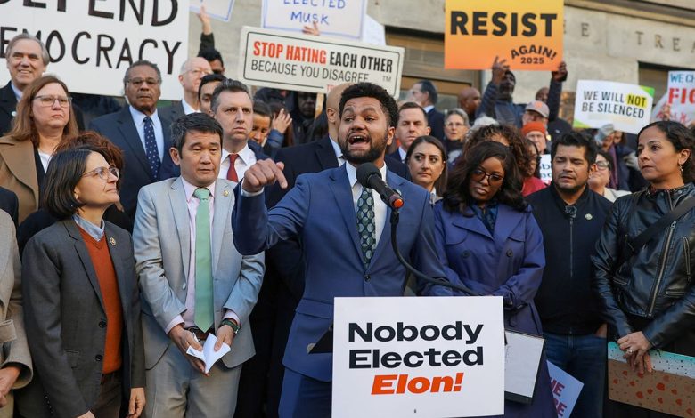 Rep Frost holds an anti-Musk protest