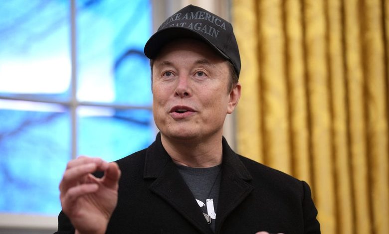 Musk in black MAGA hat in Oval Office