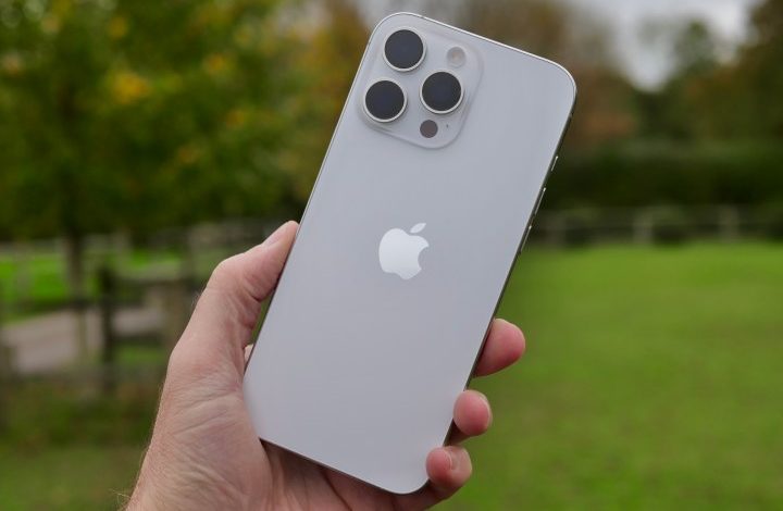 A person holding the Apple iPhone 16 Pro Max.