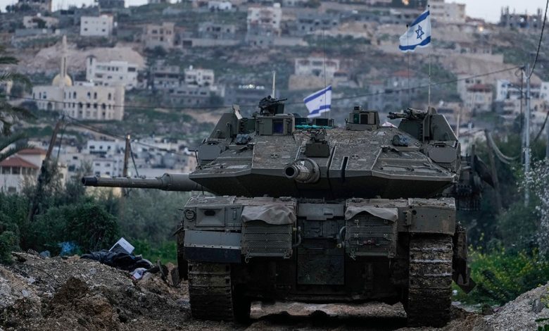 Israel moves tanks into West Bank for first time since 2002