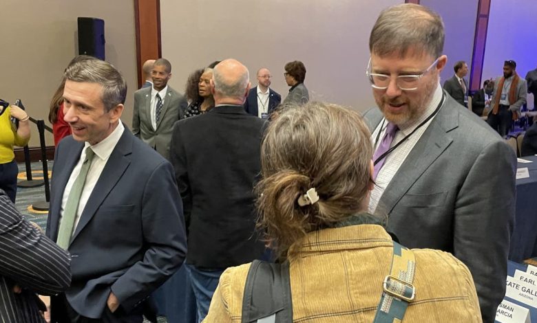 Minnesota Democratic Party chair Ken Martin (left) and Wisconsin chair Ben Wikler (right), two leading contenders in the Democratic National Committee chair race, at the DNC executive committee meeting, on Dec. 12, 2024, in Washington, D.C. 