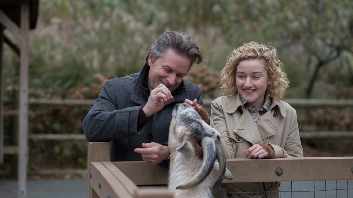 A man and woman feed a goat in Modern Love.