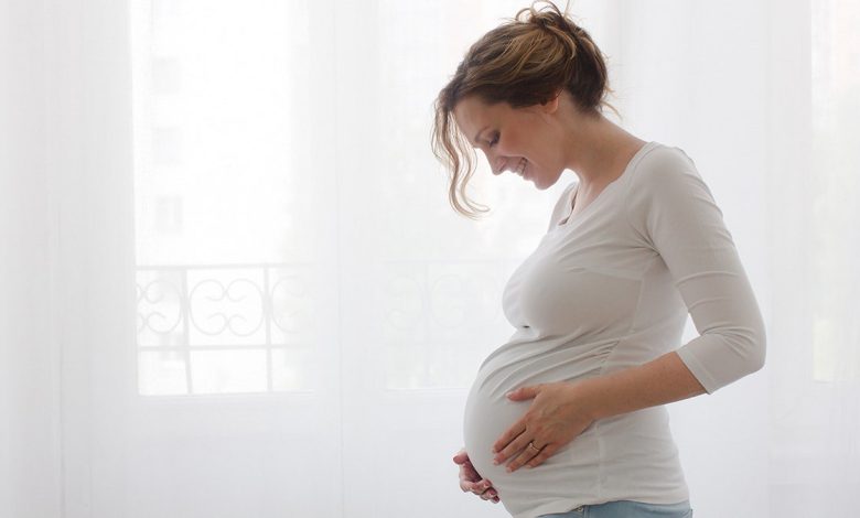 pregnant woman smiling