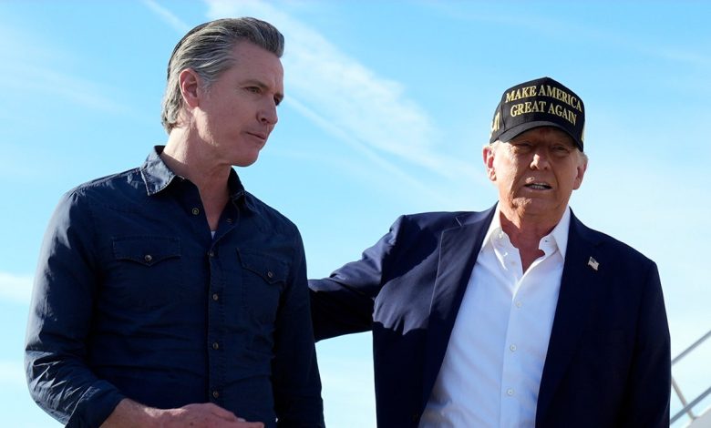 Trump, right, with arm on Gov. Newsom's back