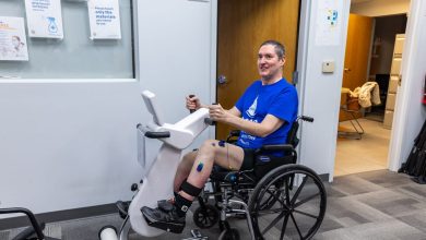 Research participant Doug McCullough uses an adaptive exercise bike during a testing session at the University of Pittsburgh.