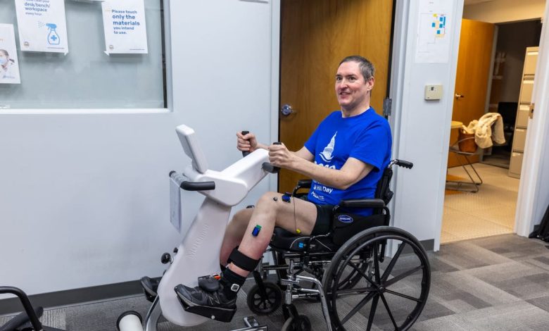 Research participant Doug McCullough uses an adaptive exercise bike during a testing session at the University of Pittsburgh.