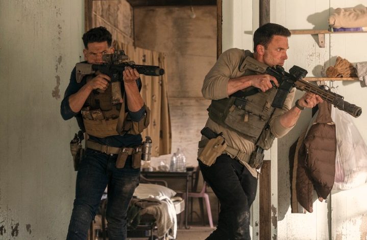 Ben Affleck and Jon Bernthal point guns in The Accountant 2.