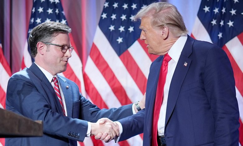 House Speaker Mike Johnson and President-elect Donald Trump shake hands