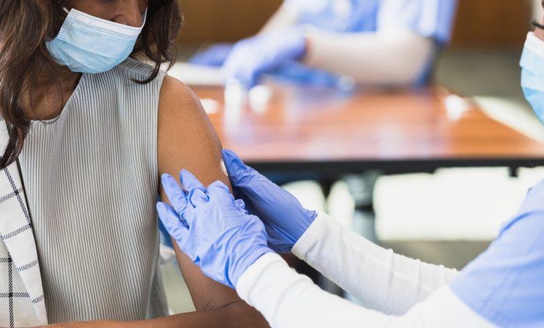 Woman getting vaccine