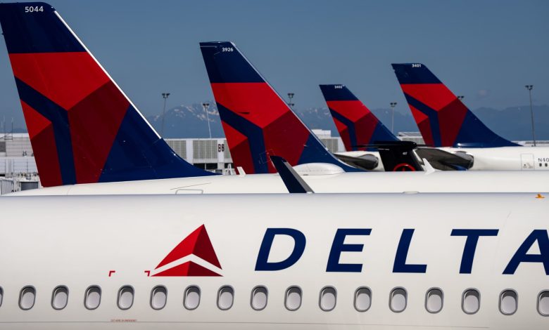 Delta Air Lines slashes earnings outlook, sending shares down