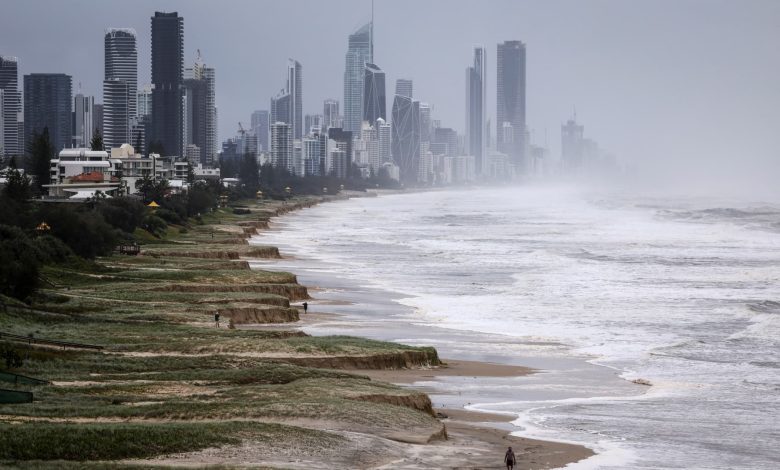 Cyclone Alfred downgraded as millions of Australians stay indoors