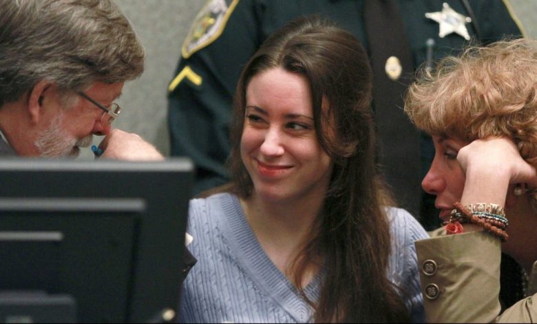 Anthony smiles at her attorney Mason before sentencing at the Orange County Courthouse in Orlando