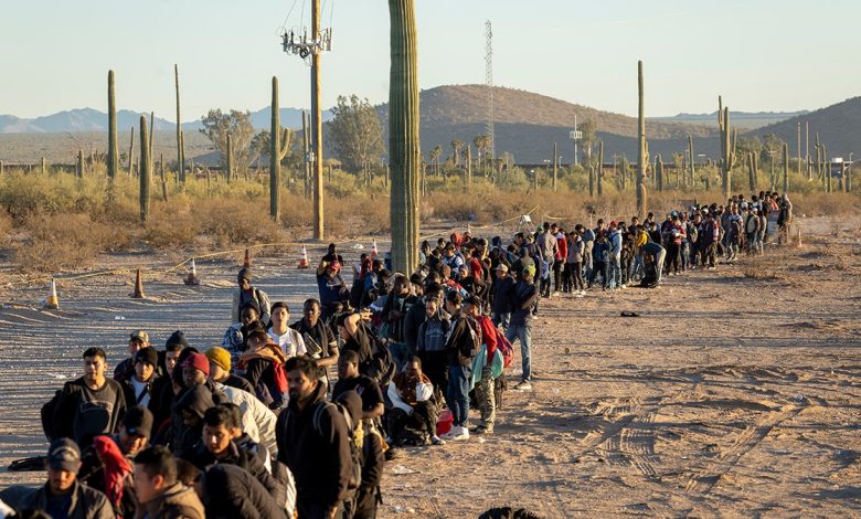 Migrants in a line