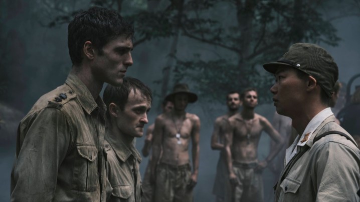 Jacob Eloridi stands in front of a commander as a soldier.