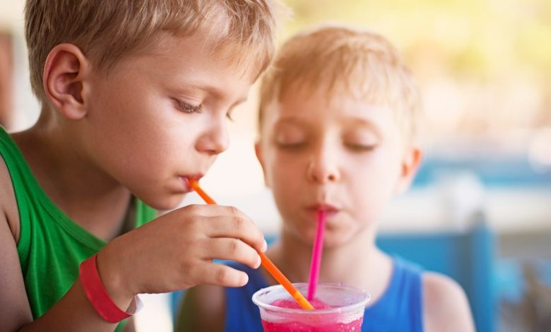 Boys drinking slushy