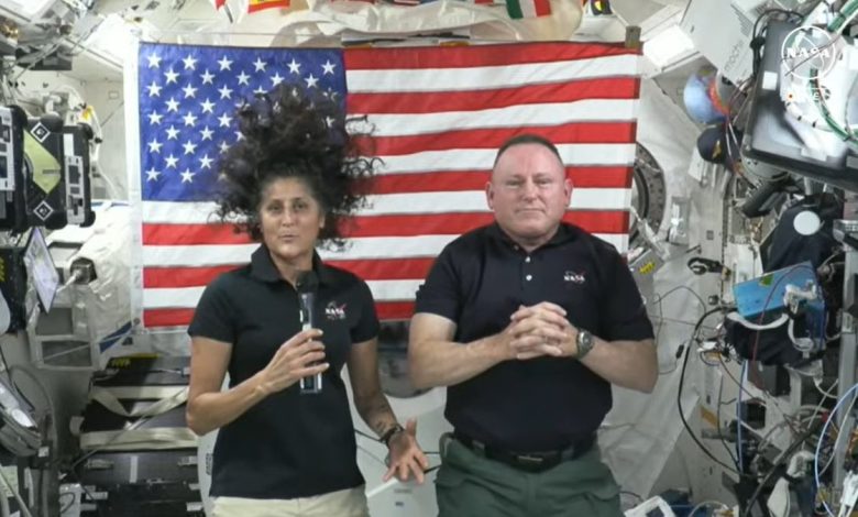 NASA astronauts Suni Williams and Butch Wilmore float inside a spacecraft