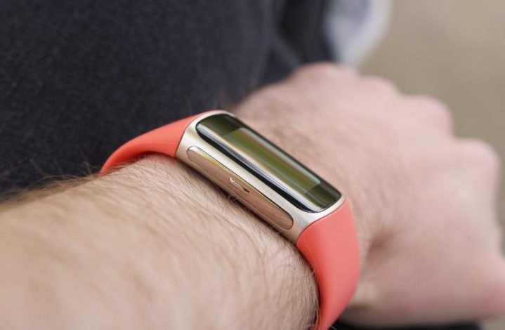 Someone wearing a Fitbit Charge 6.