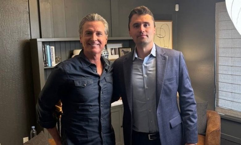 Gov. Newsom posing with Charlie Kirk, right