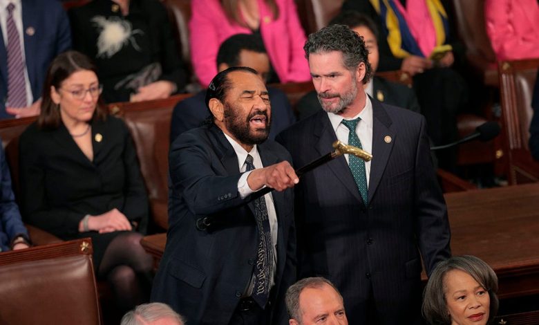 Al Green escorted out of congressional chambers after heckling Trump's address