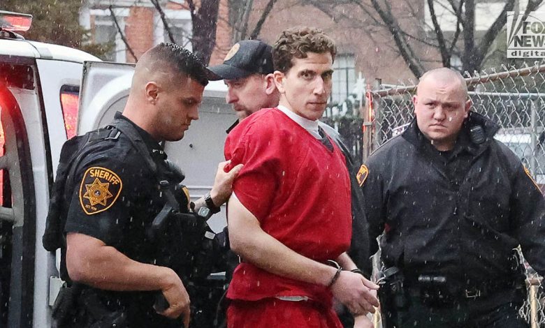 Kohberger wearing a red jail issue jumpsuit