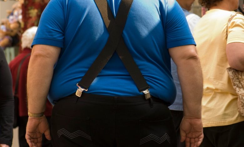 Obese man walking