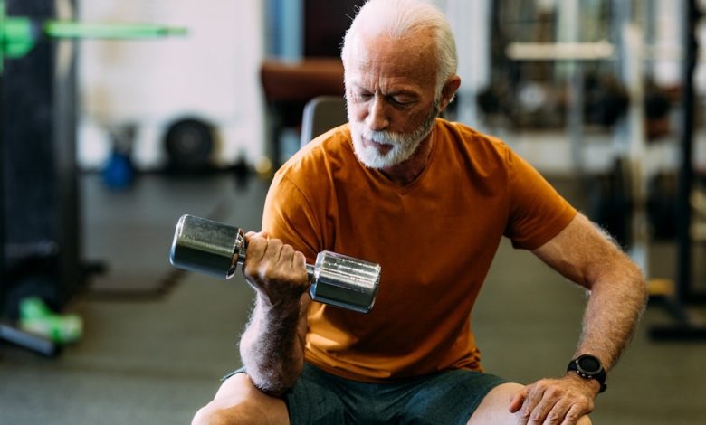 Older man lifting weights