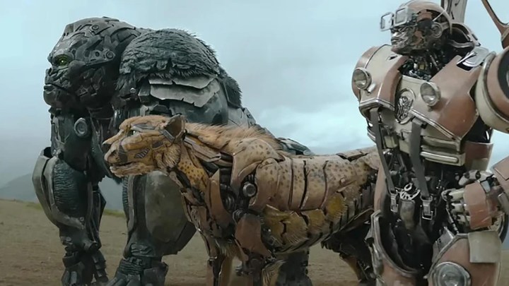 Three robotic creatures in a row in Transformers: Rise of the Beasts.