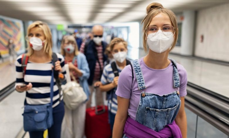 Travelers masks airport