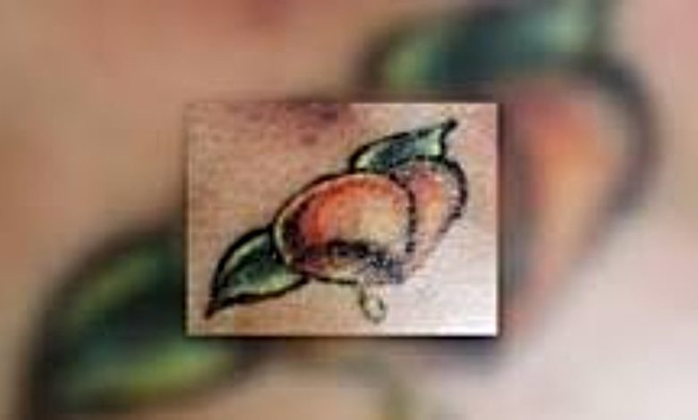 Tanya Jackson's peach tattoo