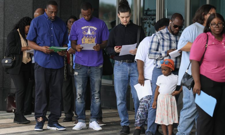 Weekly jobless claims surge to 241,000, more than expected, in latest sign of economic trouble