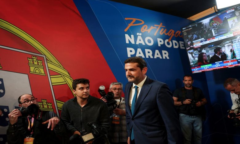 Portuguese PM's party claims election win, falls short of majority