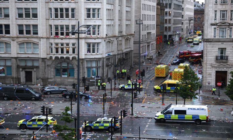 Car collides with pedestrians at parade celebrating soccer win in Liverpool, England